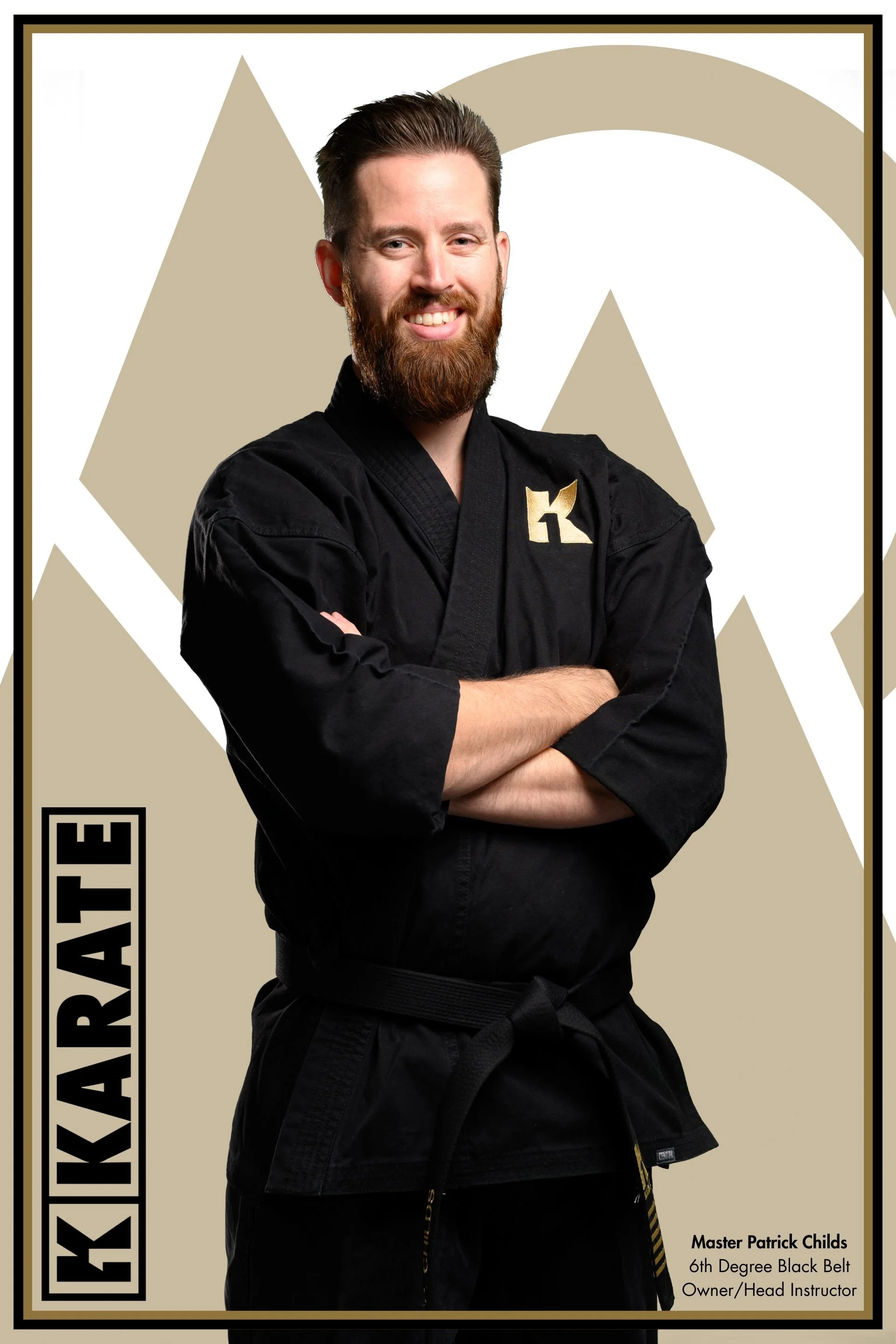 Photograph of Master Patrick Childs, a 6th Degree Black Belt in martial arts, owner, and head instructor, wearing a black gi with his arms crossed, smiling, standing in front of a graphic background with a large emblem.