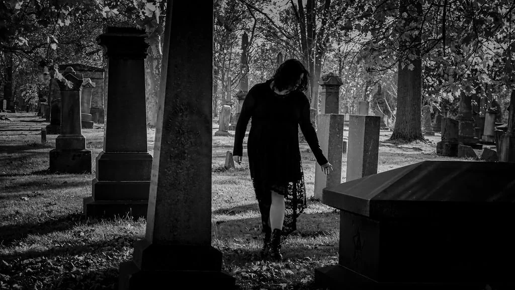 woman in graveyard