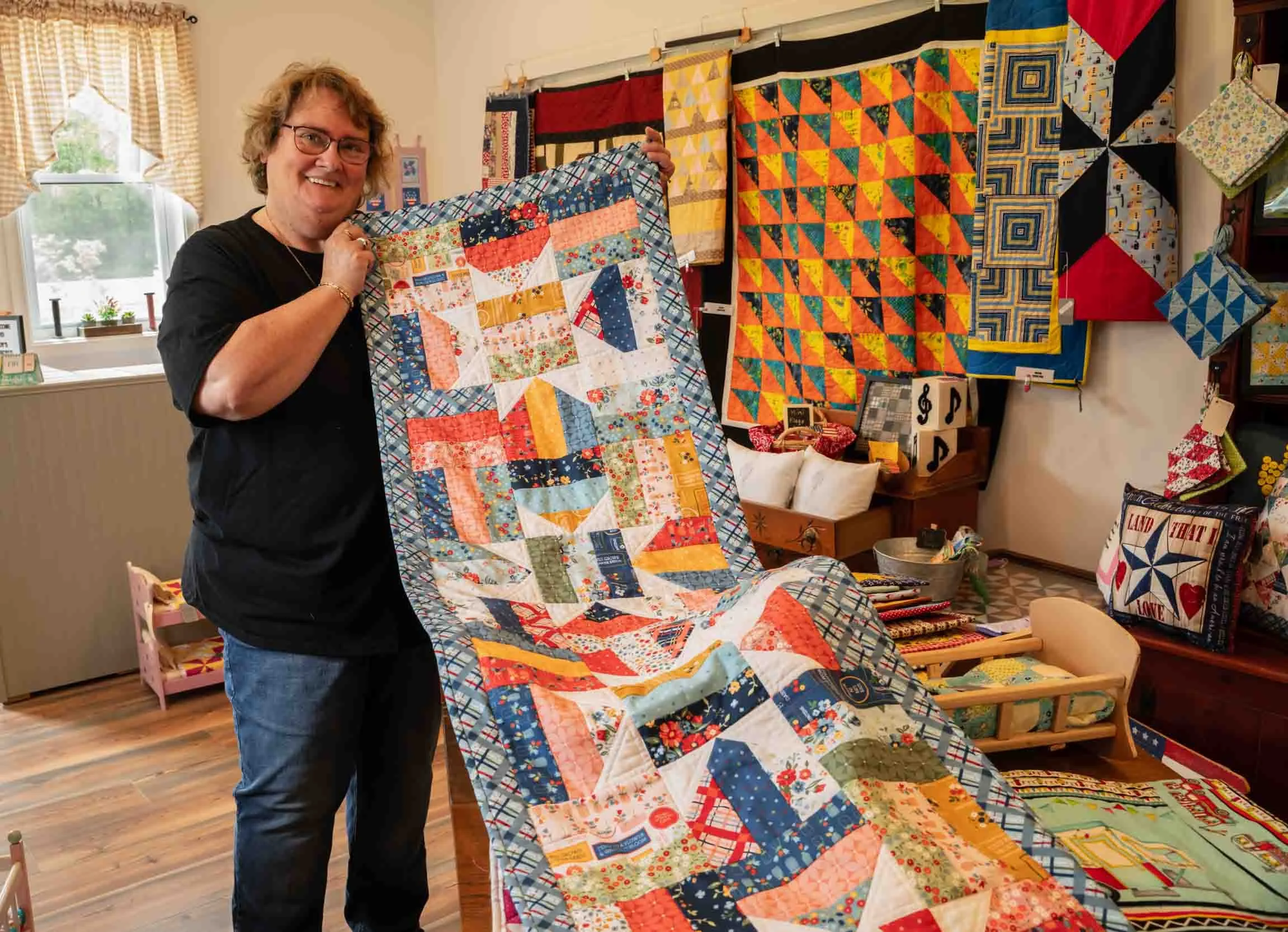 Lady in quilt store