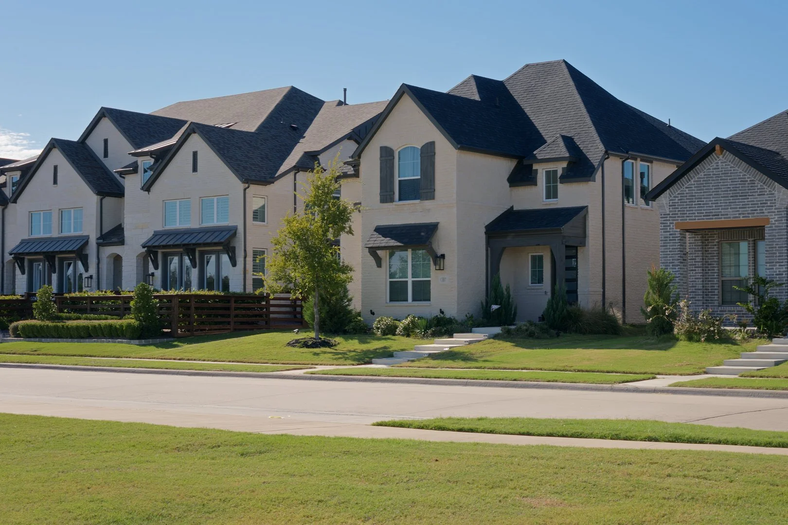 Exterior of homes along street in Trinity Falls McKinney TX