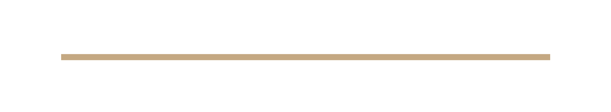 Close-up of a beige leather belt with a silver buckle on a wooden surface.