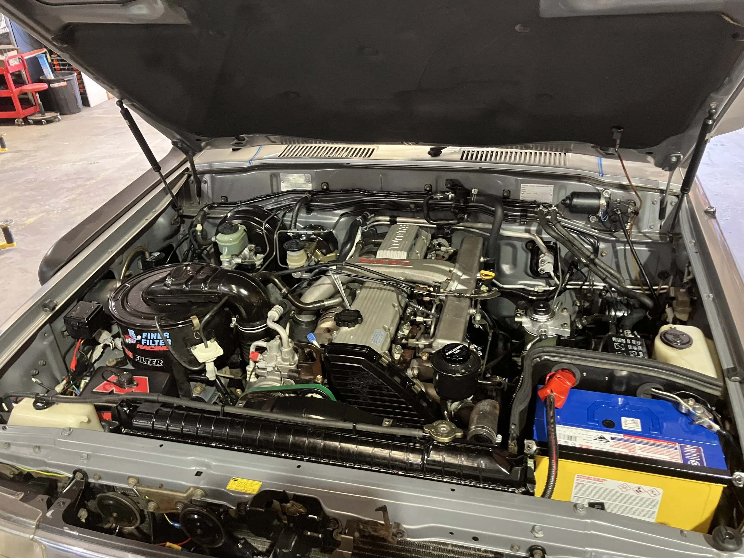 Landcruiser engine bay in for auto electrical work