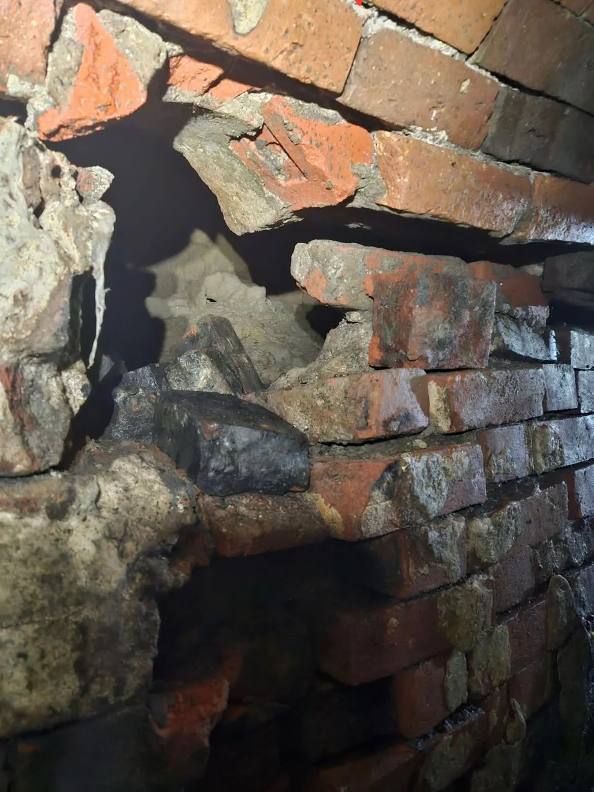 Brick sewer missing brick and surrounding soil washout