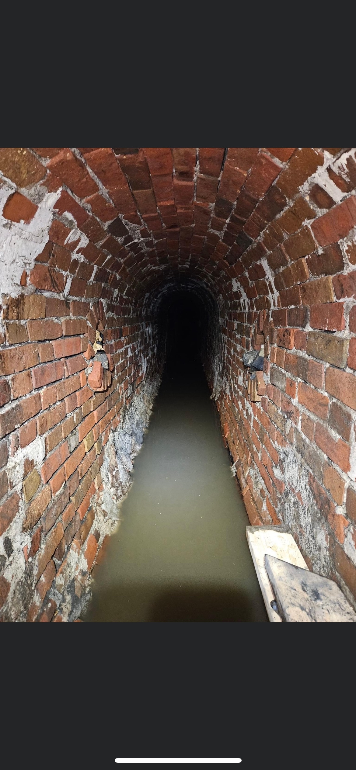 Brick sewer (egg-shaped pipe) with missing bottom