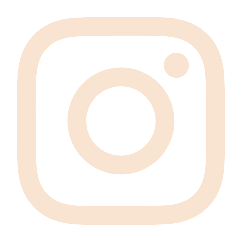 Instagram logo with a black background and cream-colored outline of a camera.