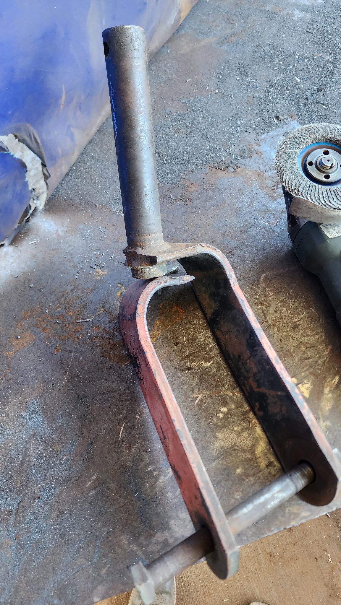 Lawn mower caster fork before
