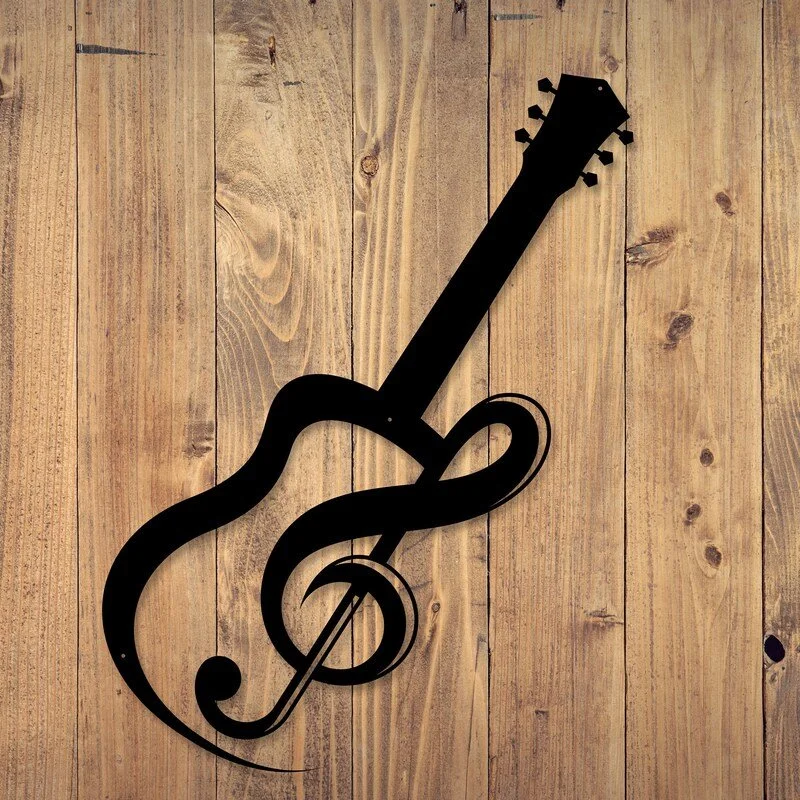 Silhouette of an electric guitar combined with a musical note, mounted on a wooden wall.