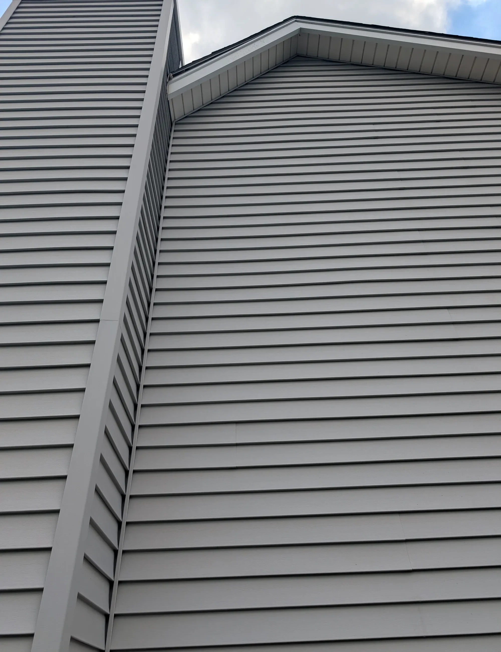 Clean house gable after soft washing by CurbSprout — Olathe, Johnson County KS