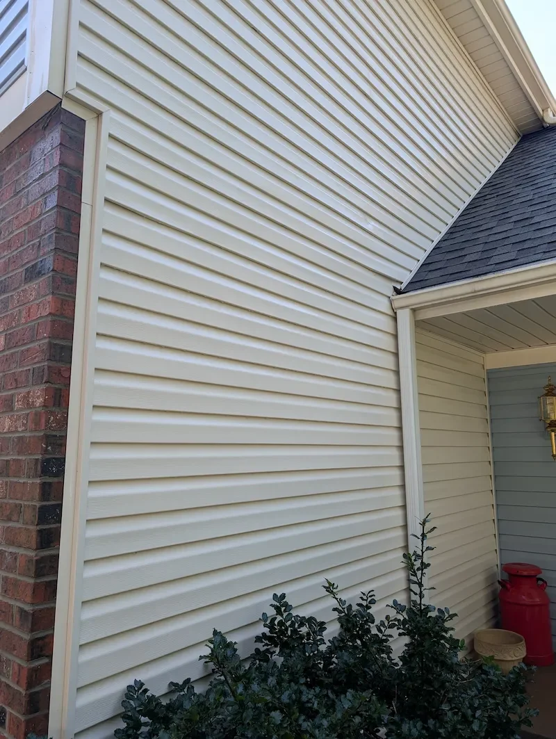 Clean house siding after soft washing by CurbSprout — Olathe, Johnson County KS