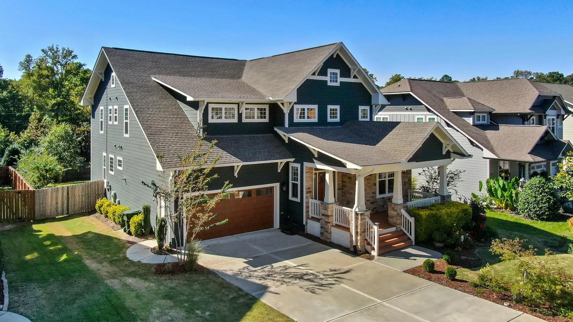 Well-maintained home exterior representing the professional soft washing standard CurbSprout brings to every job