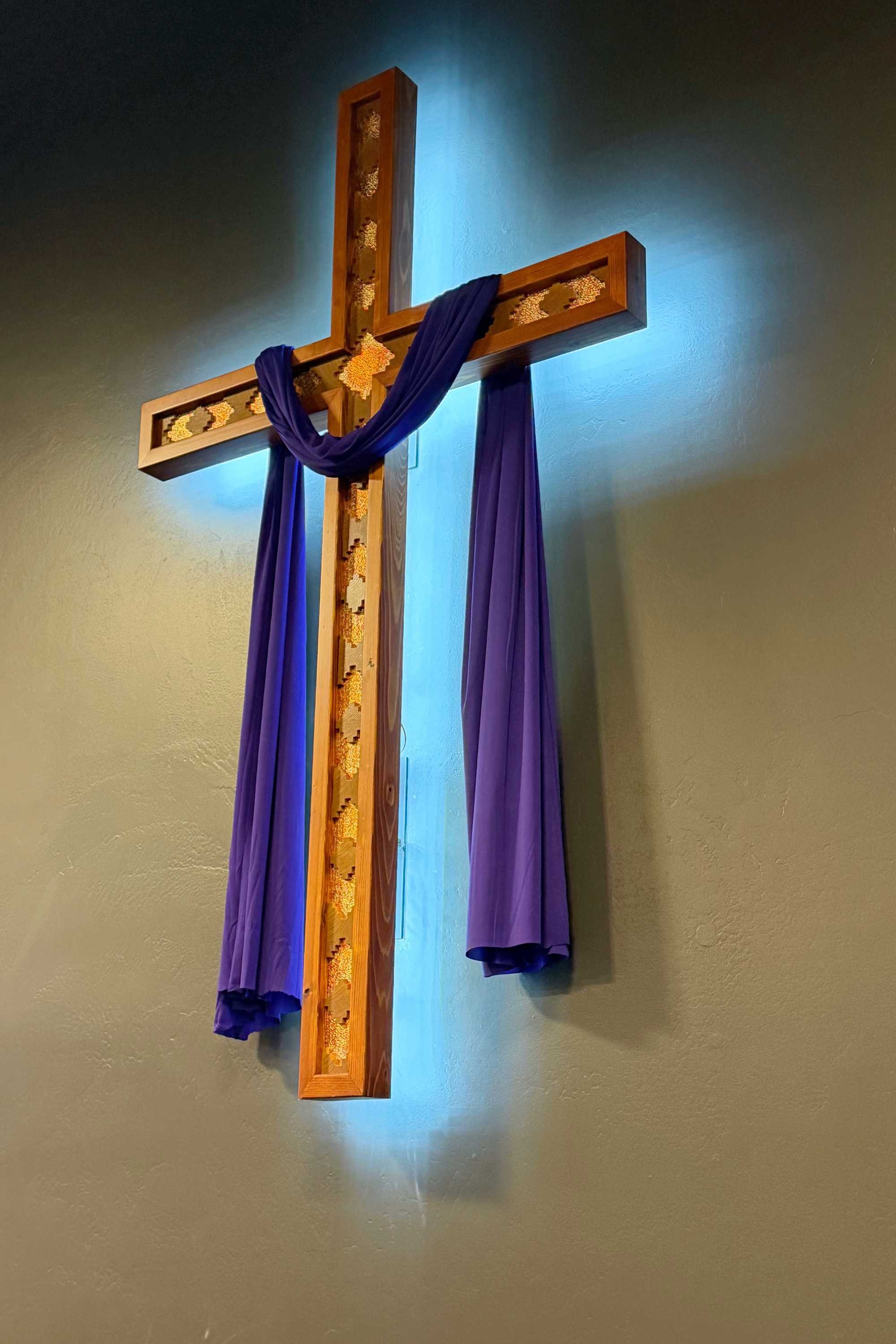 6 foot cross made of cedar and varigated copper backlit by LED lighting