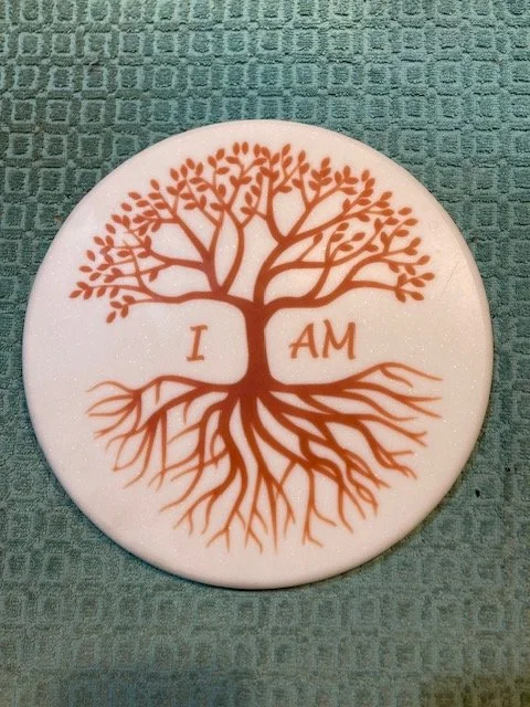 CNC carved designs on Corian and filled with colored epoxy resin