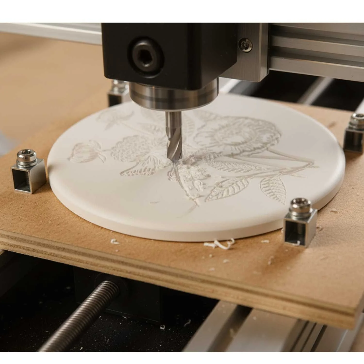 CNC carved designs on Corian. Used as hotplates