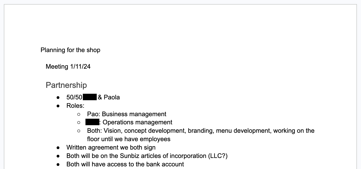Screenshot of an early Una Más business planning document listing '50/50' ownership as a single bullet point, with names redacted, alongside notes on roles and meeting agenda items