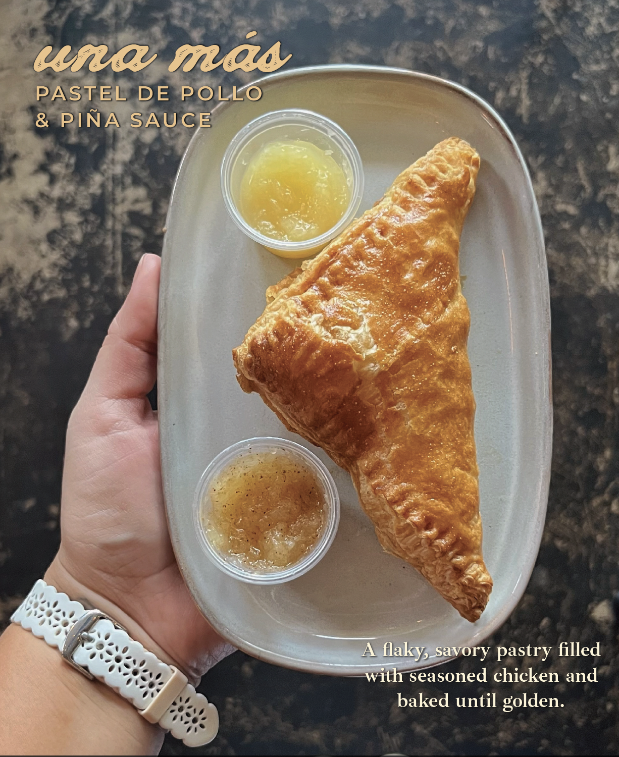 A hand holding a white oval plate with a baked chicken pastel filled with seasoned chicken, accompanied by two small containers of sauces, one yellow and one brown. The background is dark and textured. Text on the image describes the pastel as flaky and savory.