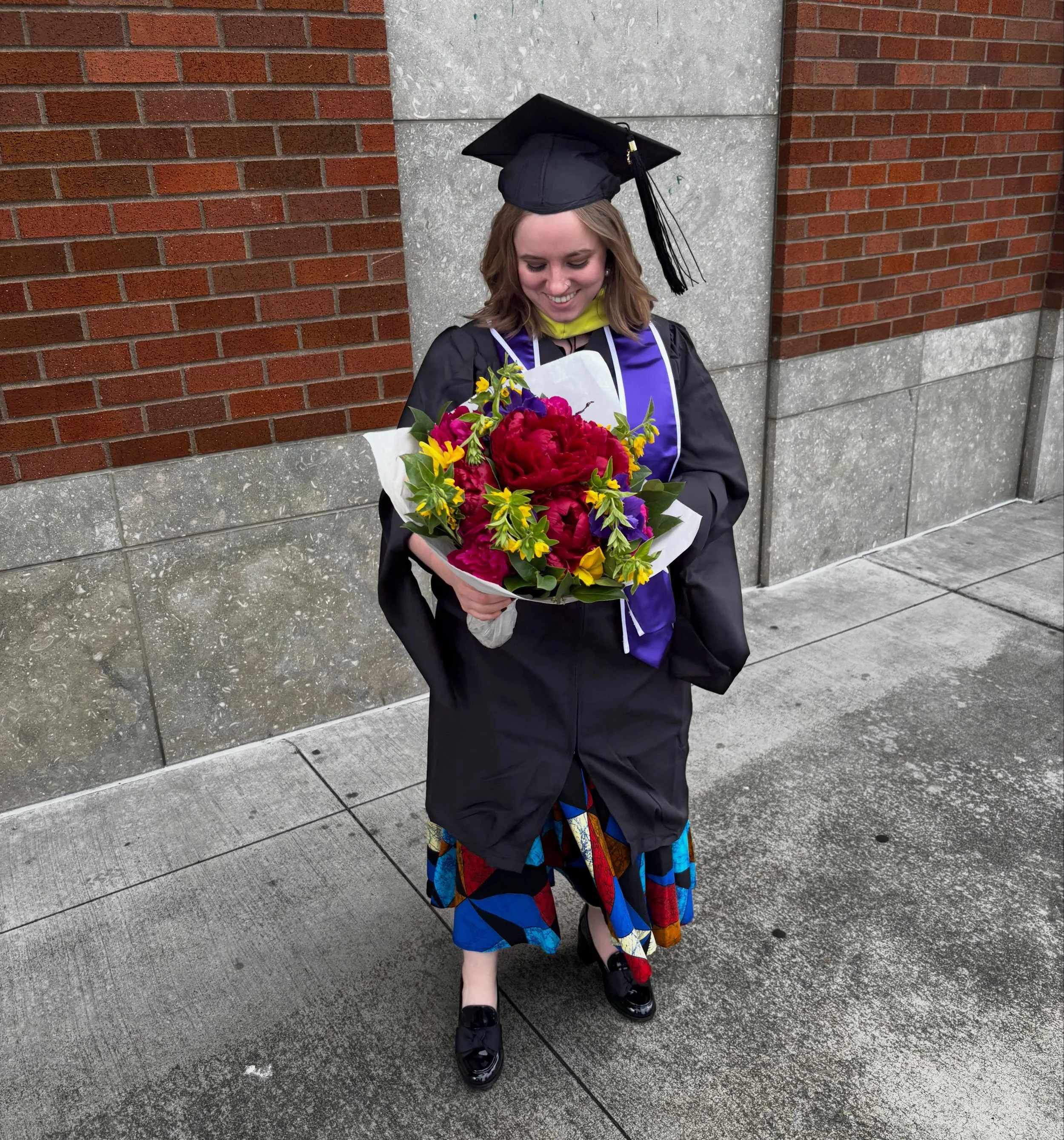 Officially graduated with my Masters in Library and Information Science (MLIS) from @uwischool ❤️