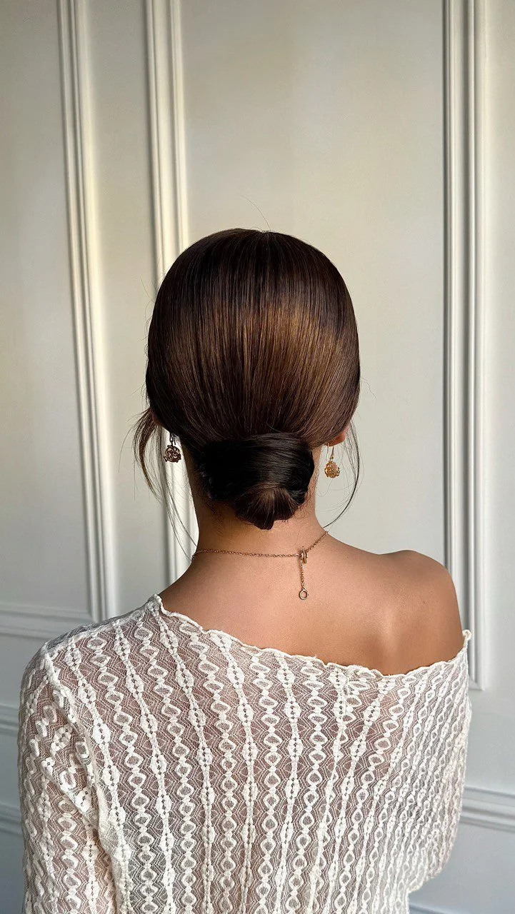 Elegant bridal bun with exposed neckline — wedding updo by Yanita Esqao, Los Angeles