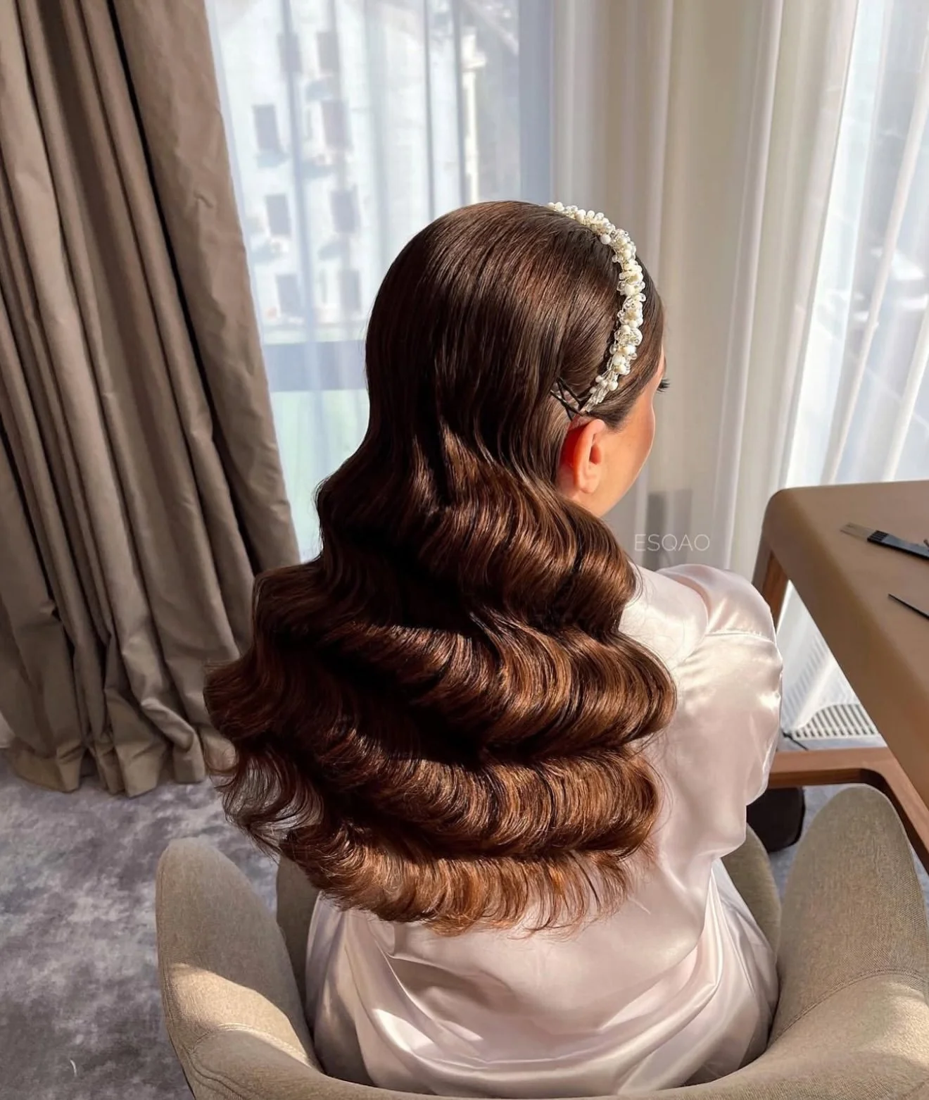 Bridal hair styling in progress — Yanita Esqao creating wedding updo with pearl headband, Los Angeles