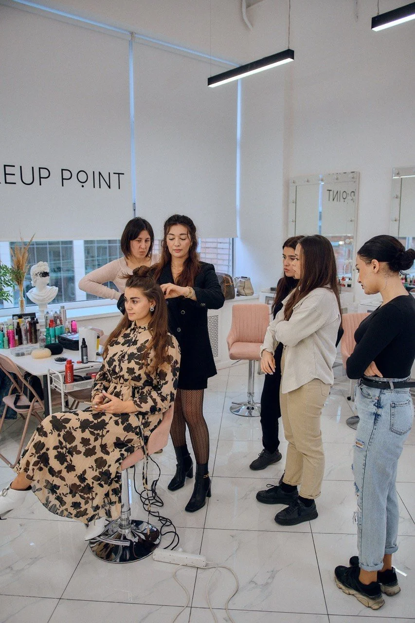 Bridal hair group class in Los Angeles — students practicing wedding hairstyles at ESQAO Academy