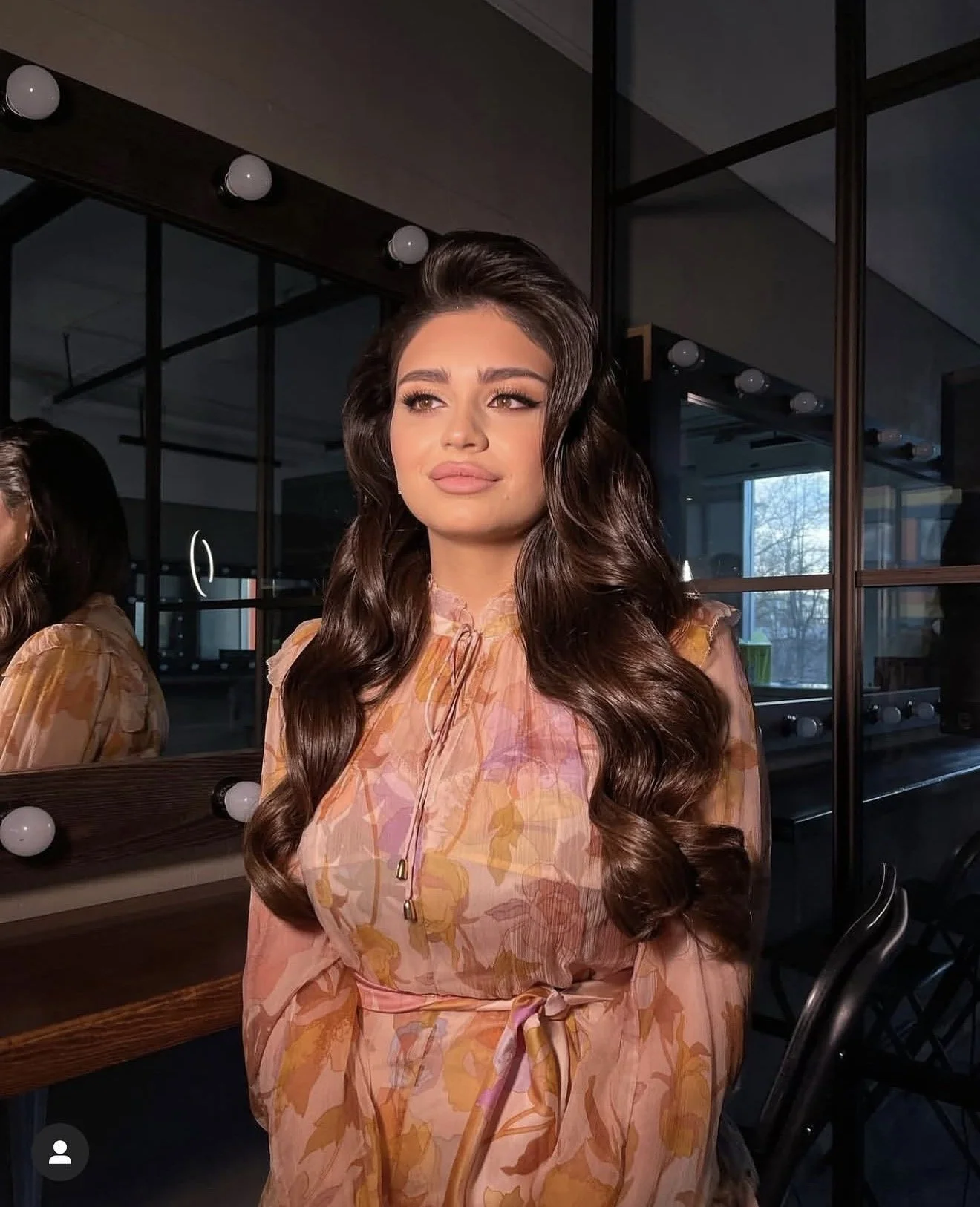 Bride getting Hollywood waves styled in Los Angeles salon — bridal hair by ESQAO