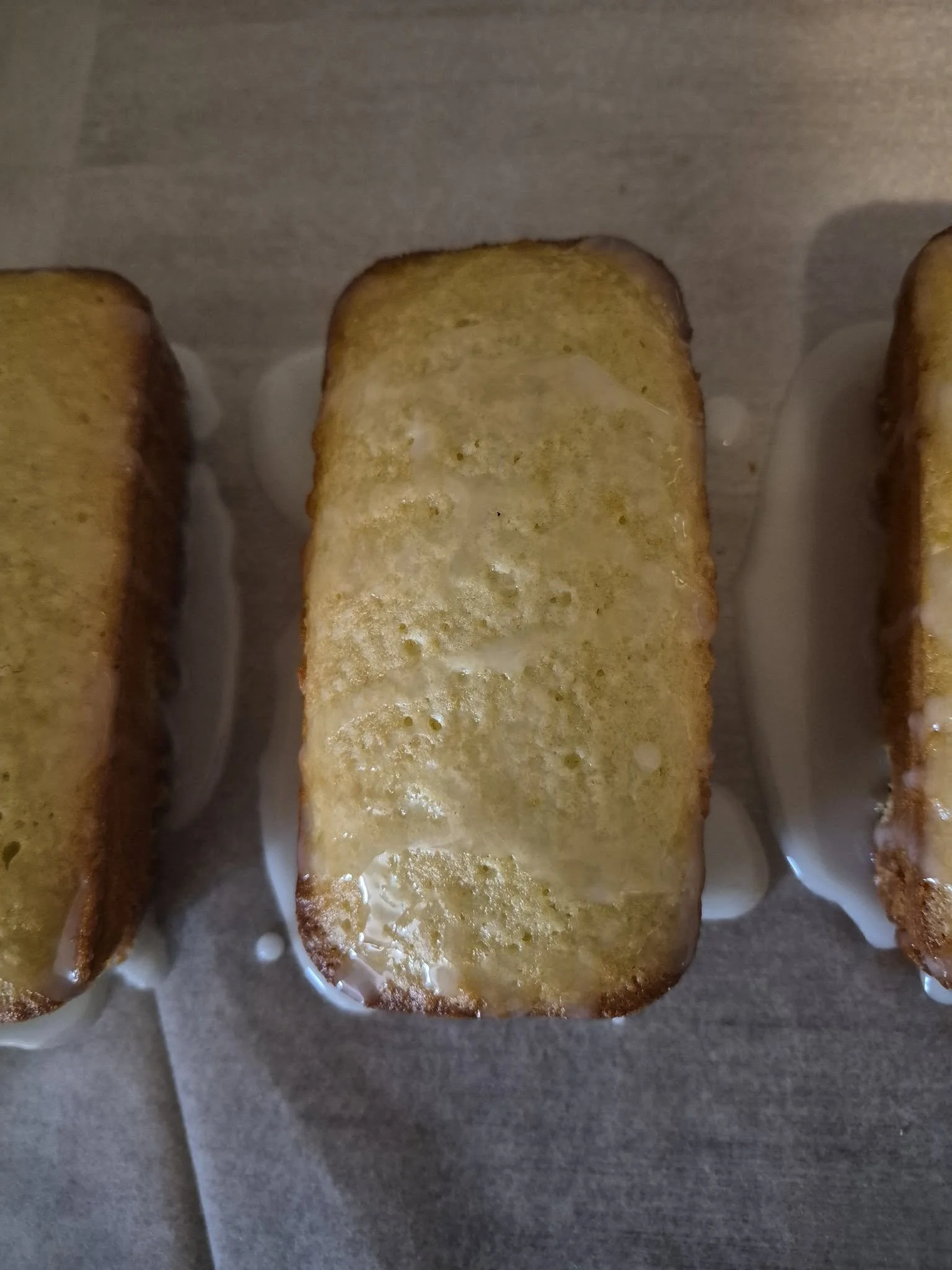 Fresh homemade bread topped with melted butter from a local baker at Upstate Markets in Greenville, SC.