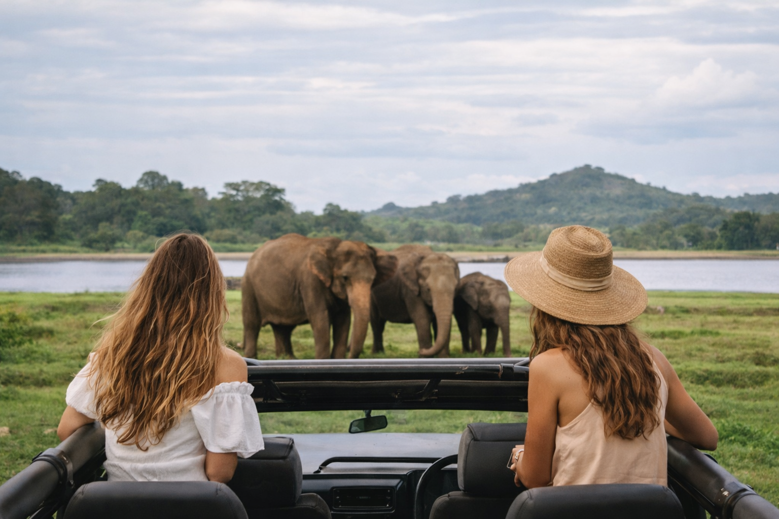 Two women on safari watching elephants Sri Lanka wellness retreat experience
