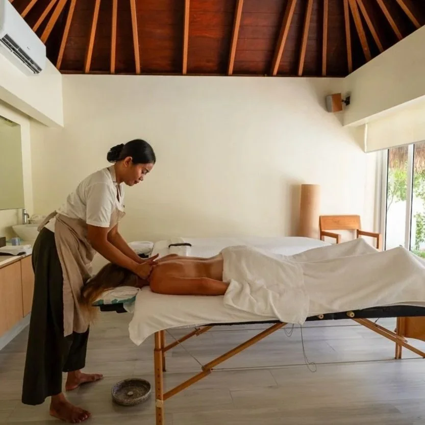 Traditional Balinese massage treatment at Bali yoga and pilates retreat Indonesia luxury spa wellness experience