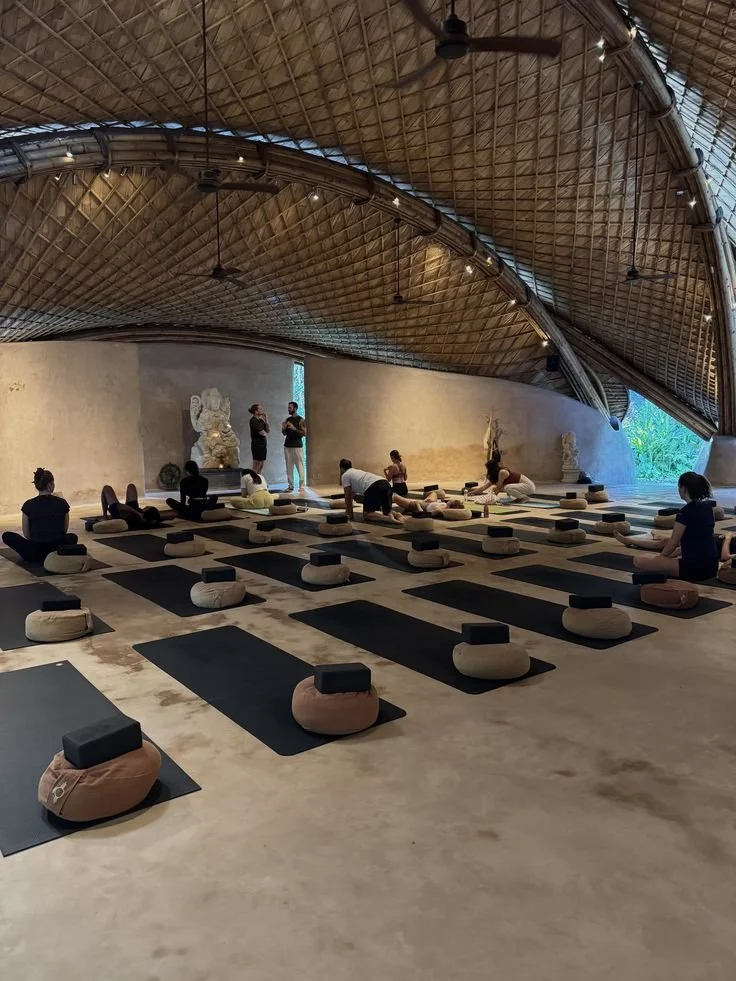 Yin yoga class at Alchemy Bali — group yoga session on Holistic Escapes wellness retreat