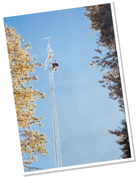 Dan working in IT tech on a pole