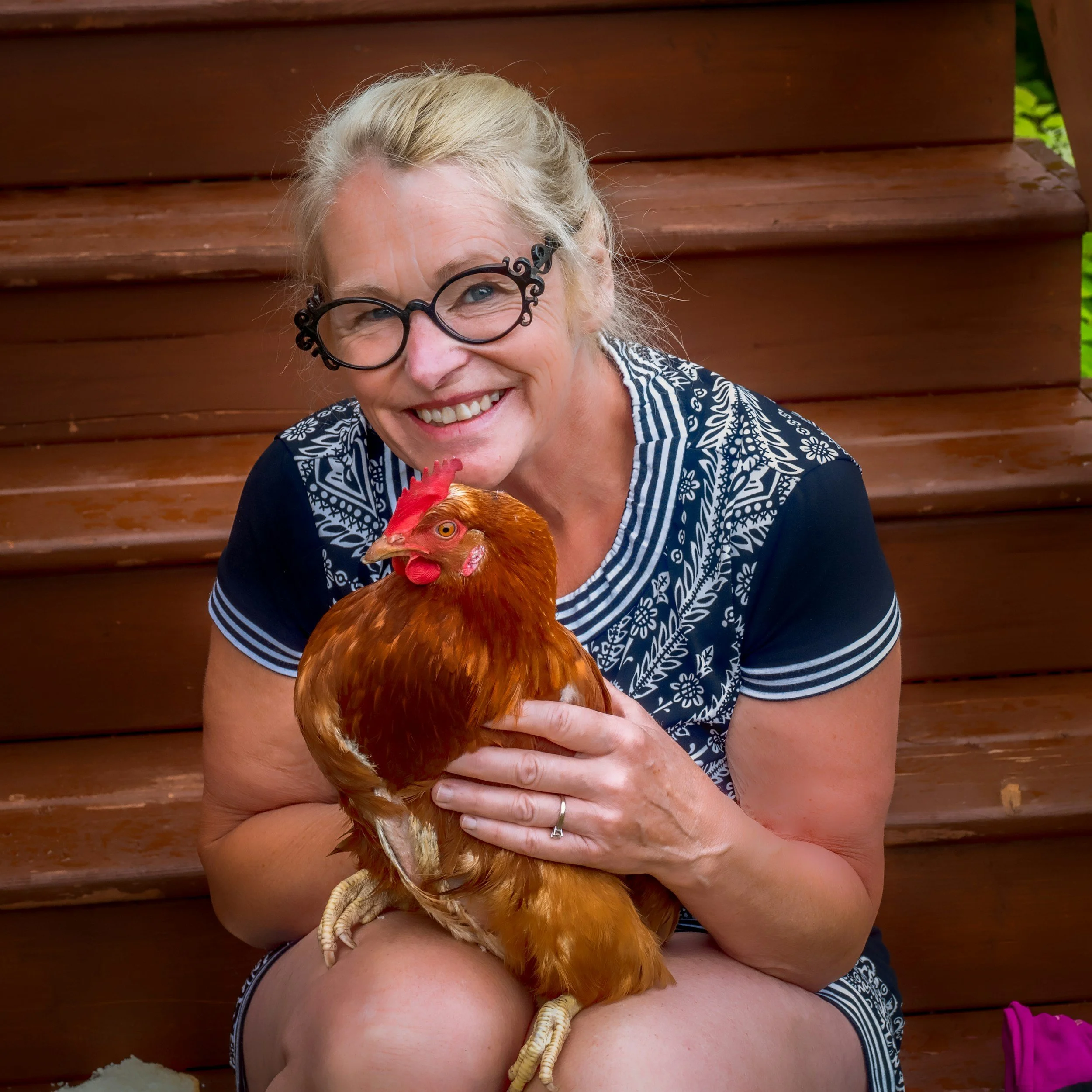 lady holding chicken