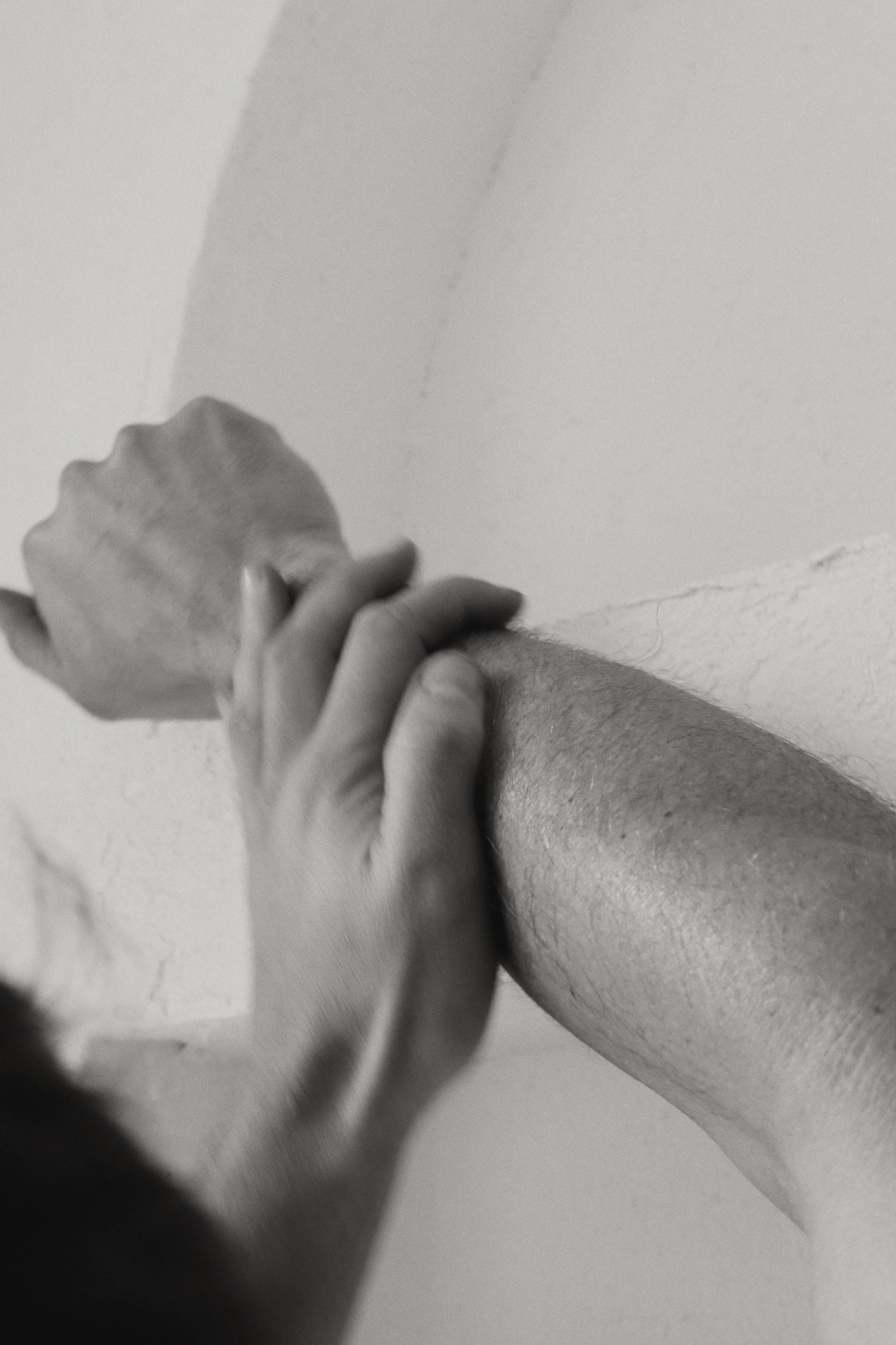 hands-applying-skincare-monochrome.jpg