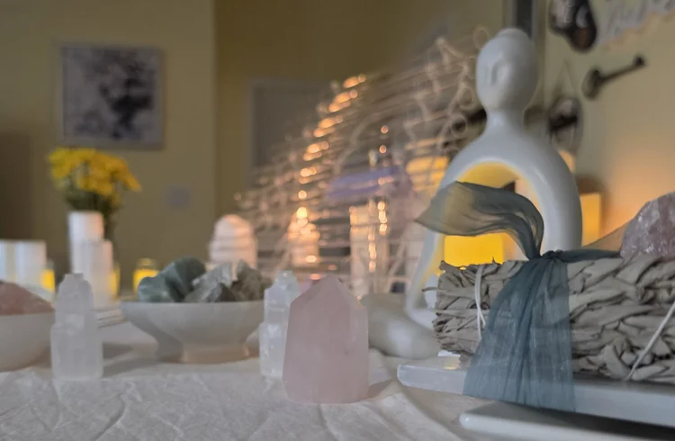 Crystal harp, candles and selenite