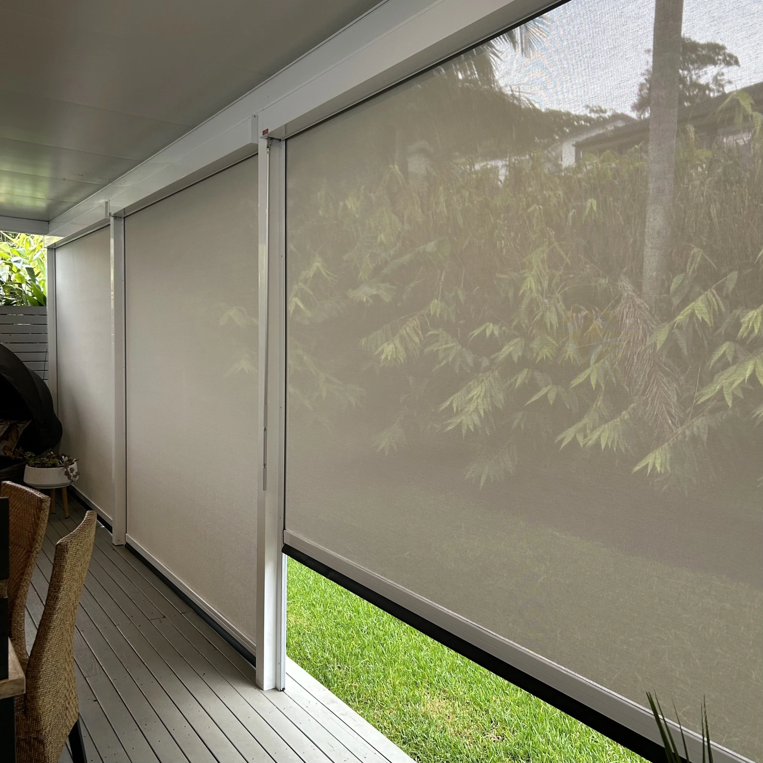 Stratco Ambient Outdoor Blinds styled by Platinum Decks to create a relaxed, high‑end alfresco zone