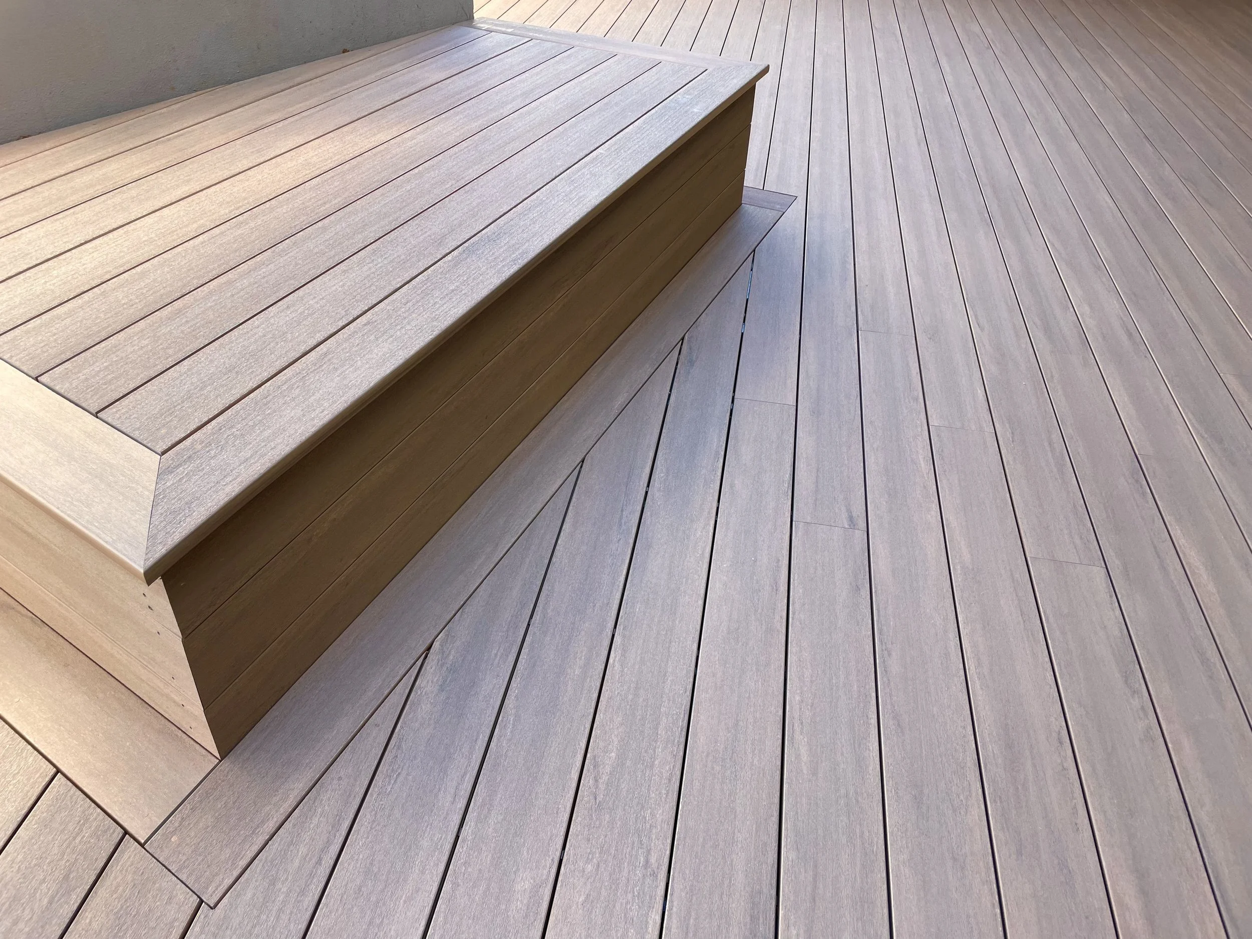 Built‑in bench feature integrated into timbertech deck designed by Platinum Decks to maximise comfort and functionality in premium outdoor areas
