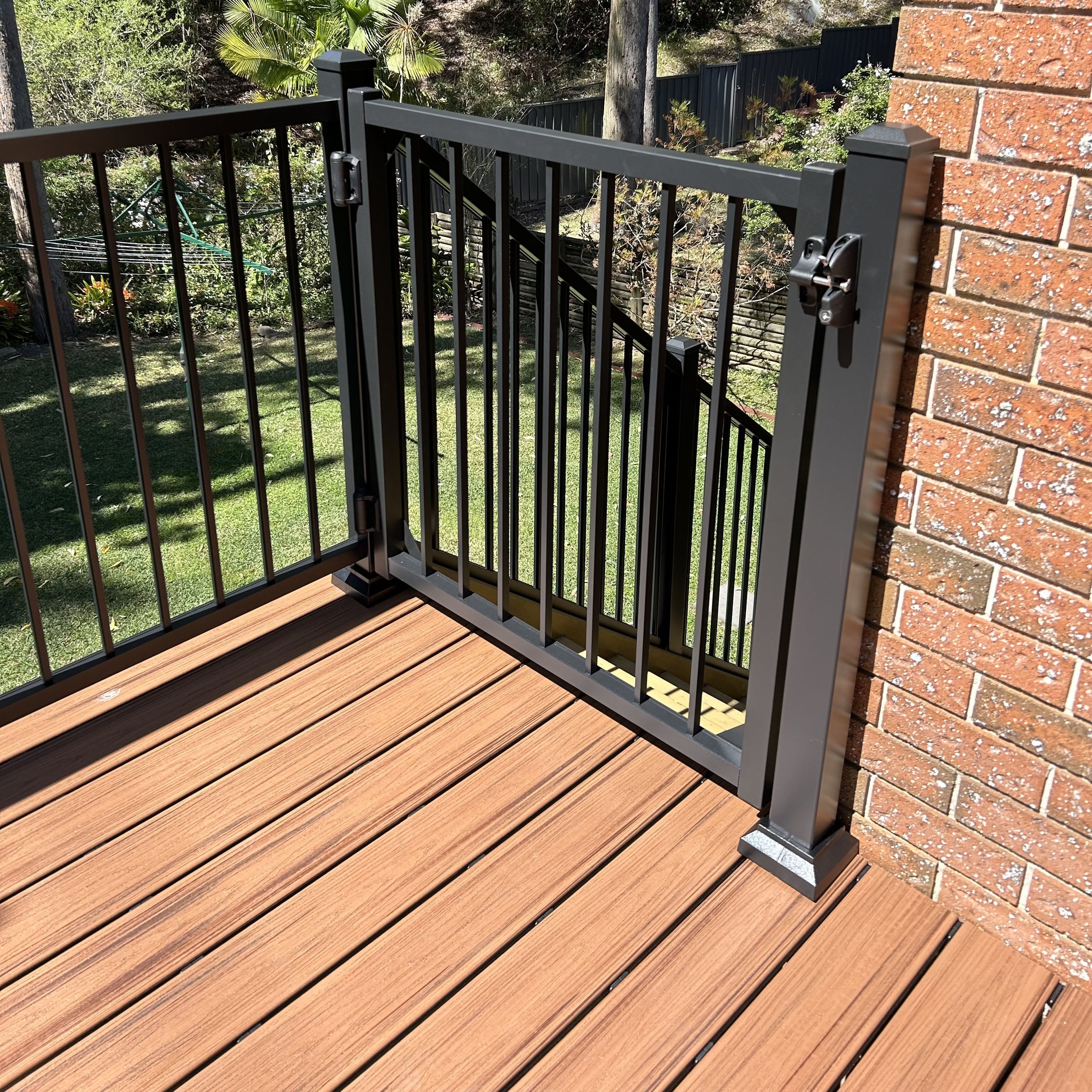 Custom composite stair design with smooth, uniform treads built by Platinum Decks to elevate access with a luxury, coastal‑ready finish