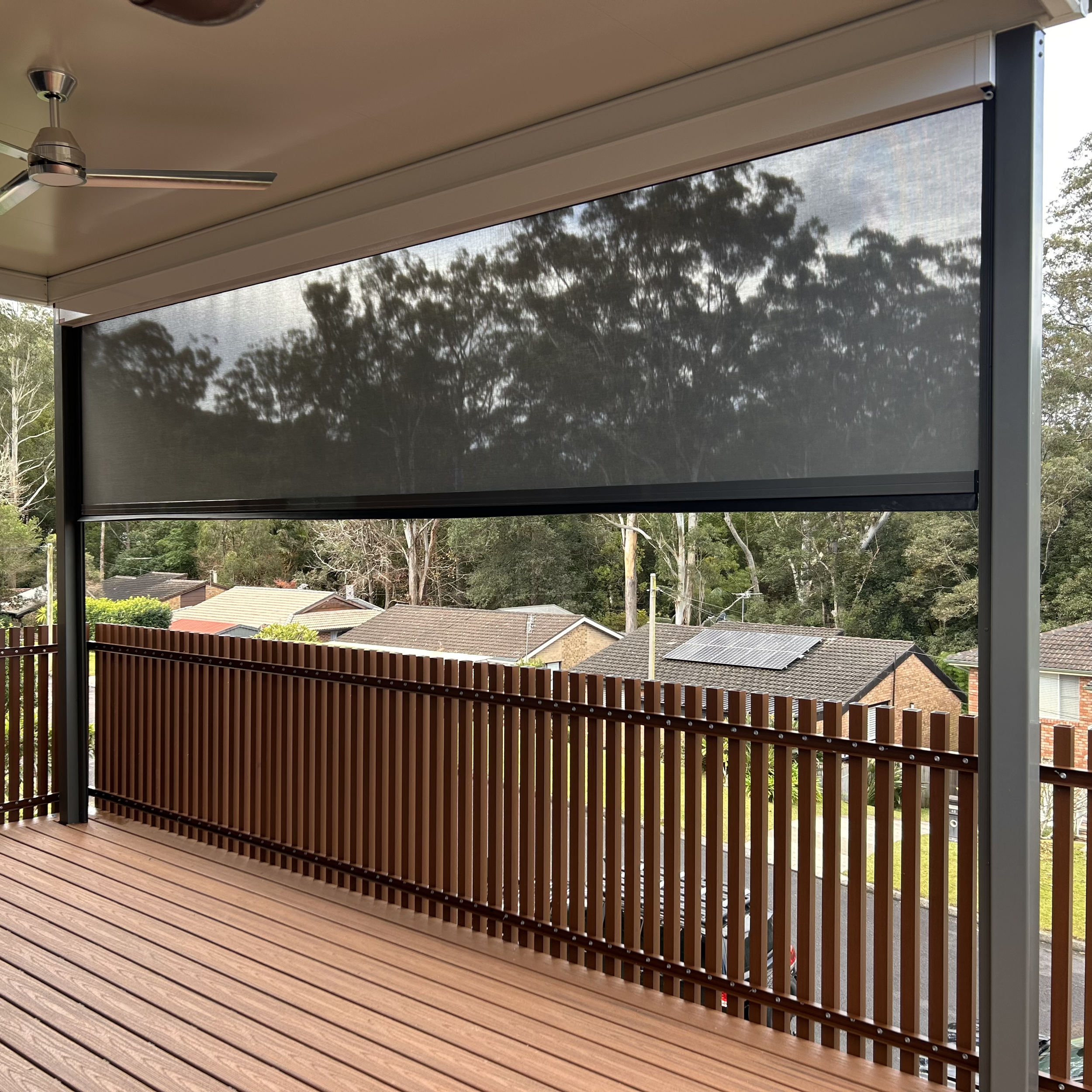Premium outdoor blind system integrated into a modern alfresco installed by Platinum Decks to deliver shade, privacy and a high‑end architectural look