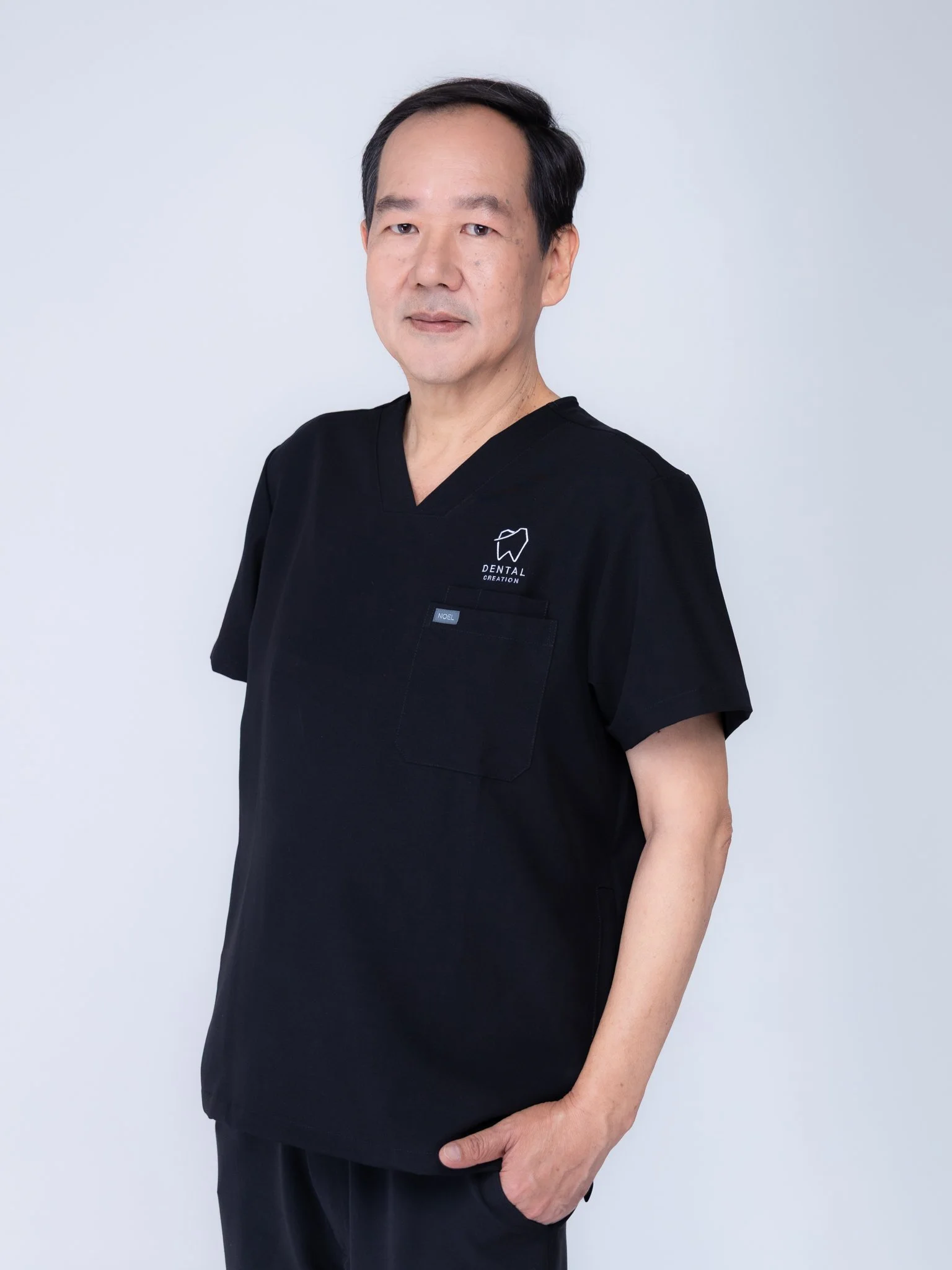 Dr. Kongkiet Krongbaramee, our Prosthodontist