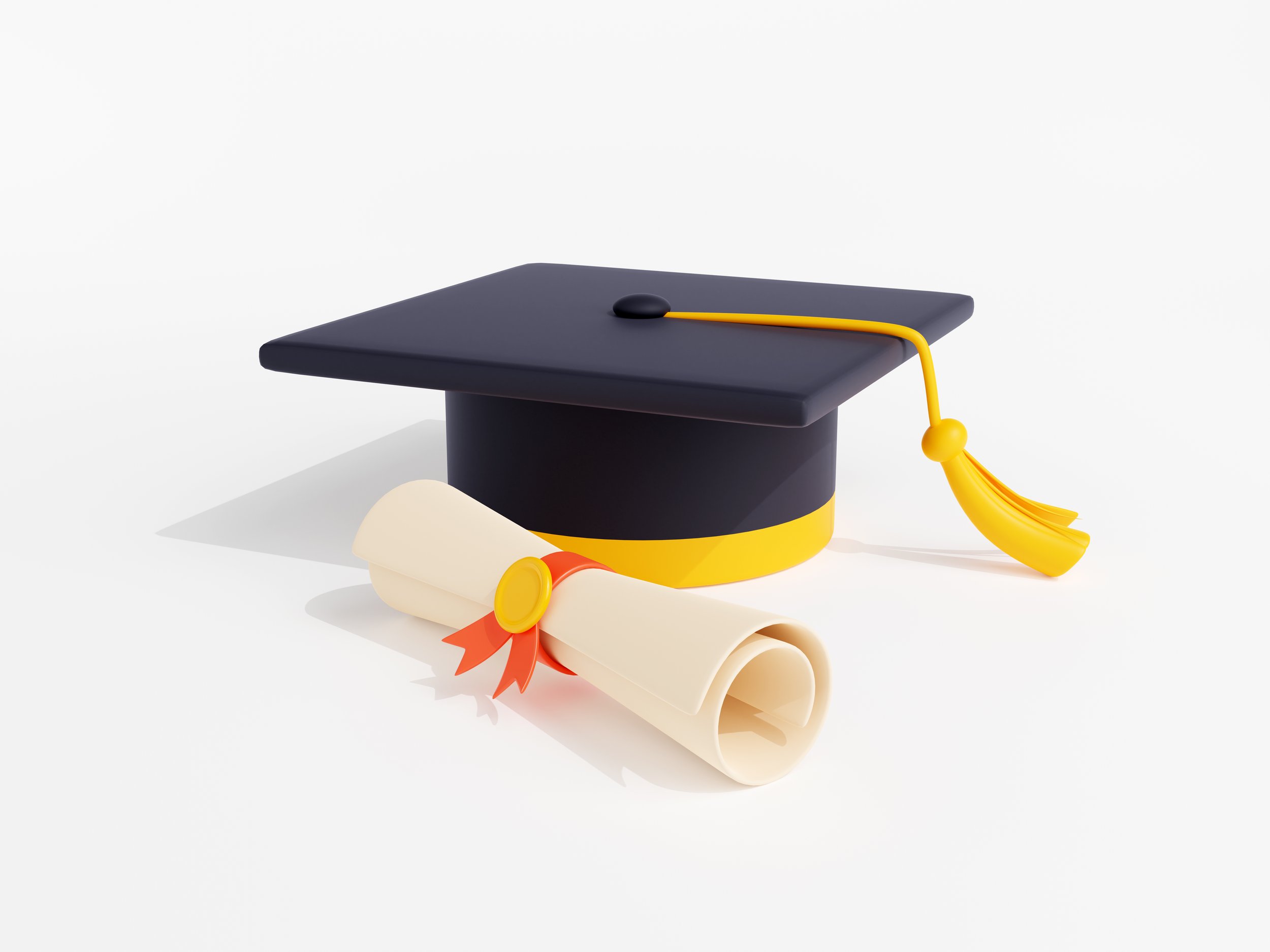A black graduation cap with a yellow tassel on top, a rolled diploma tied with a red ribbon underneath, and a yellow tassel hanging from the cap.