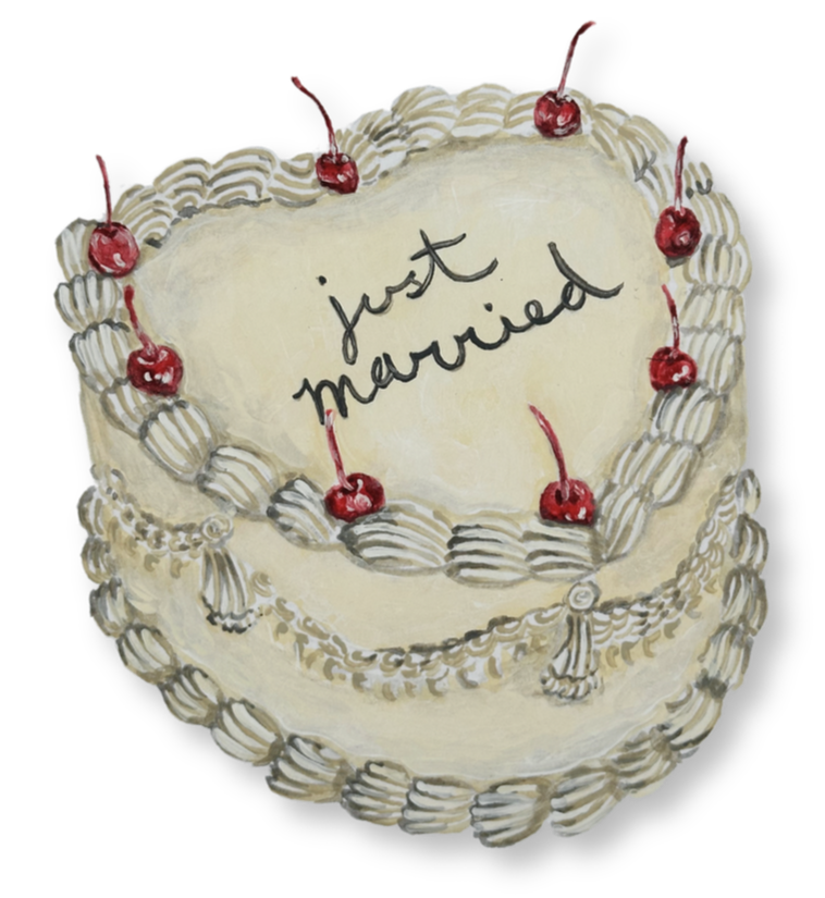A wedding cake with white frosting, decorated with red cherries and intricate icing patterns, with the words 'just married' written on top.