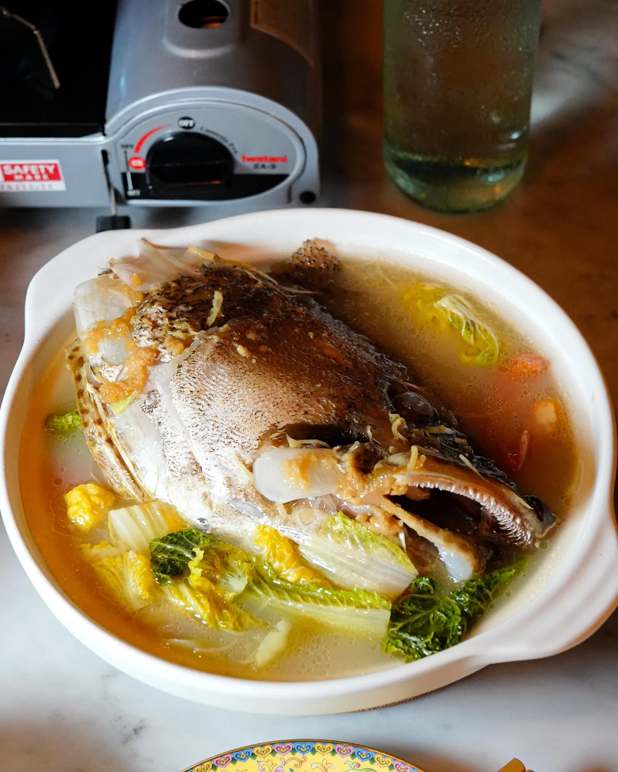 A claypot worth gathering around. Fresh fish head, rich broth, and all the comforting flavours you know and love.