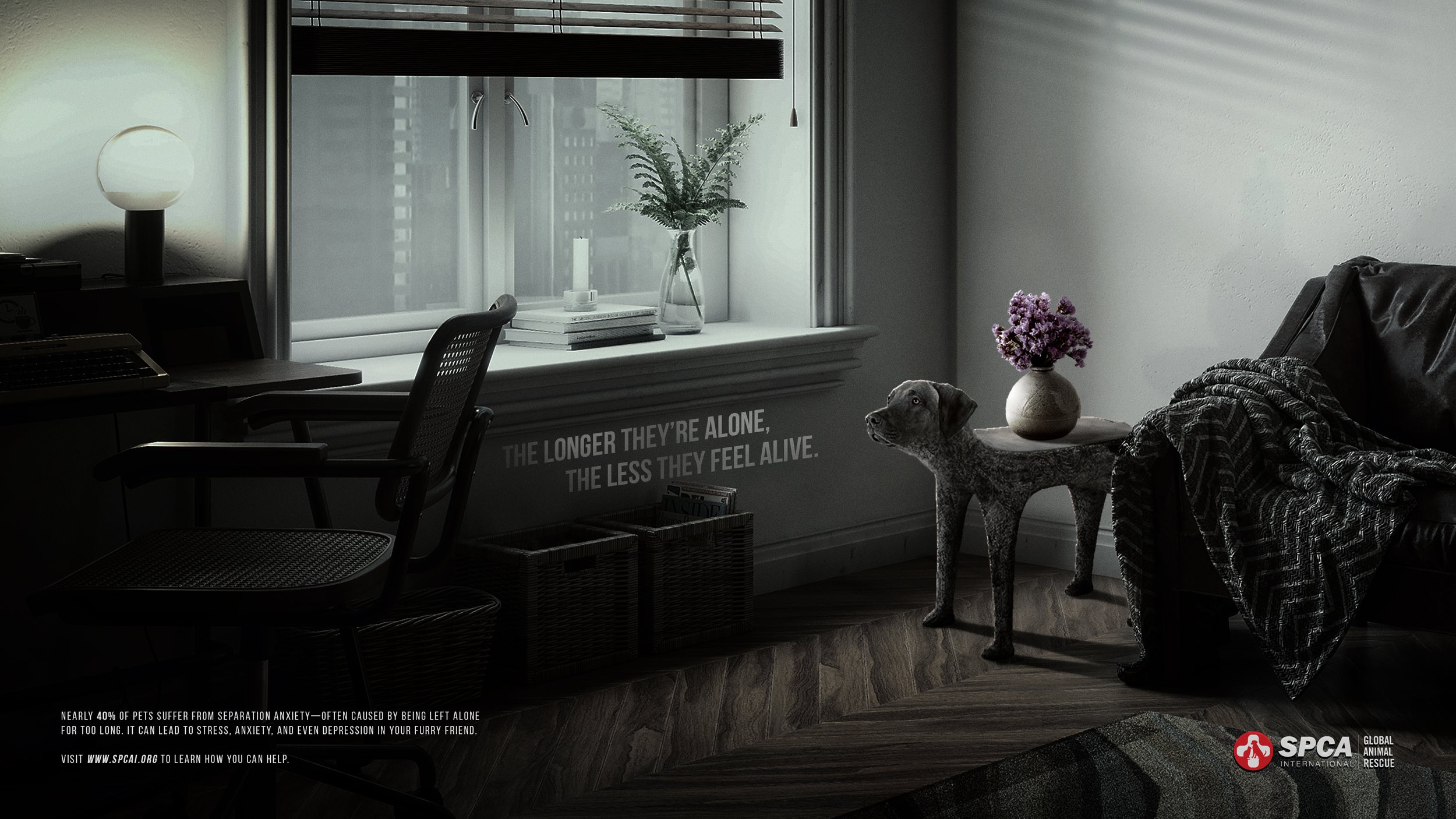 A cozy living space with a desk by a window, a white lamp, a stack of books, and a vase with green foliage. A gray patterned dog sits on a small table next to a black leather chair and a sofa draped with a striped blanket. There is a quote on the wall that reads, 'The longer they're alone, the less they feel alive.'