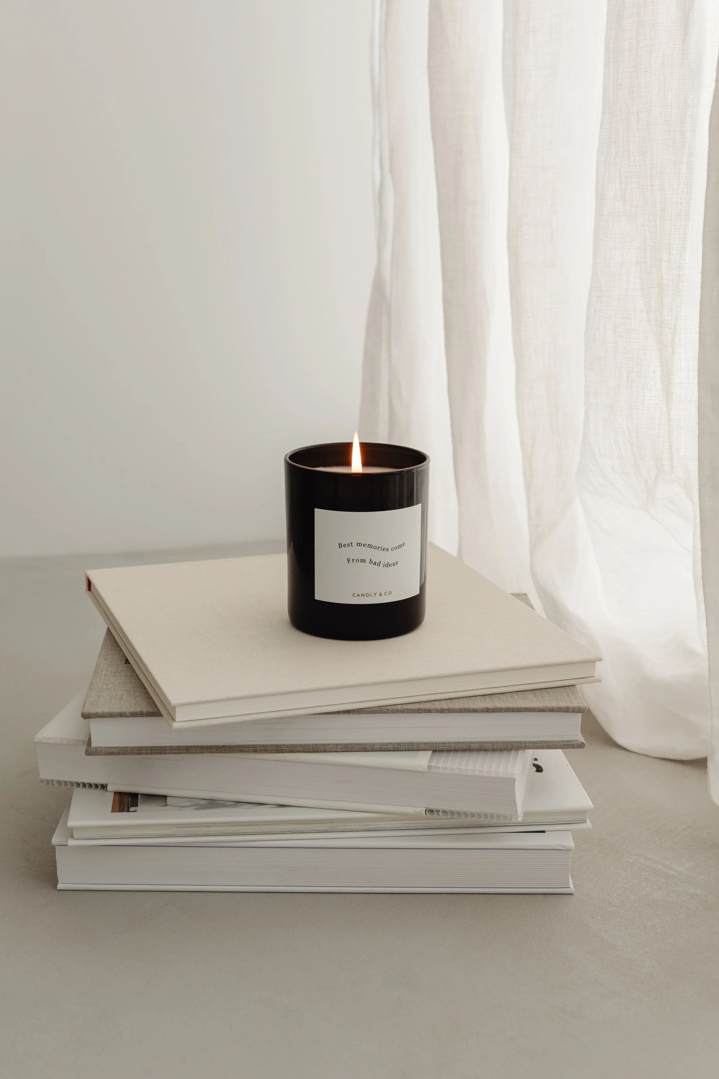 kaboompics_home-decorations-beige-armchair-candles-book-blanket-32092.jpg