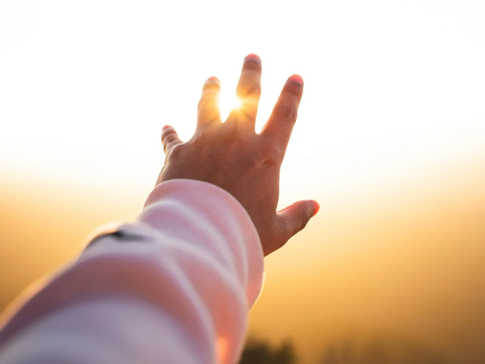Picture of a hand reaching out for mental health support from Space 2B You