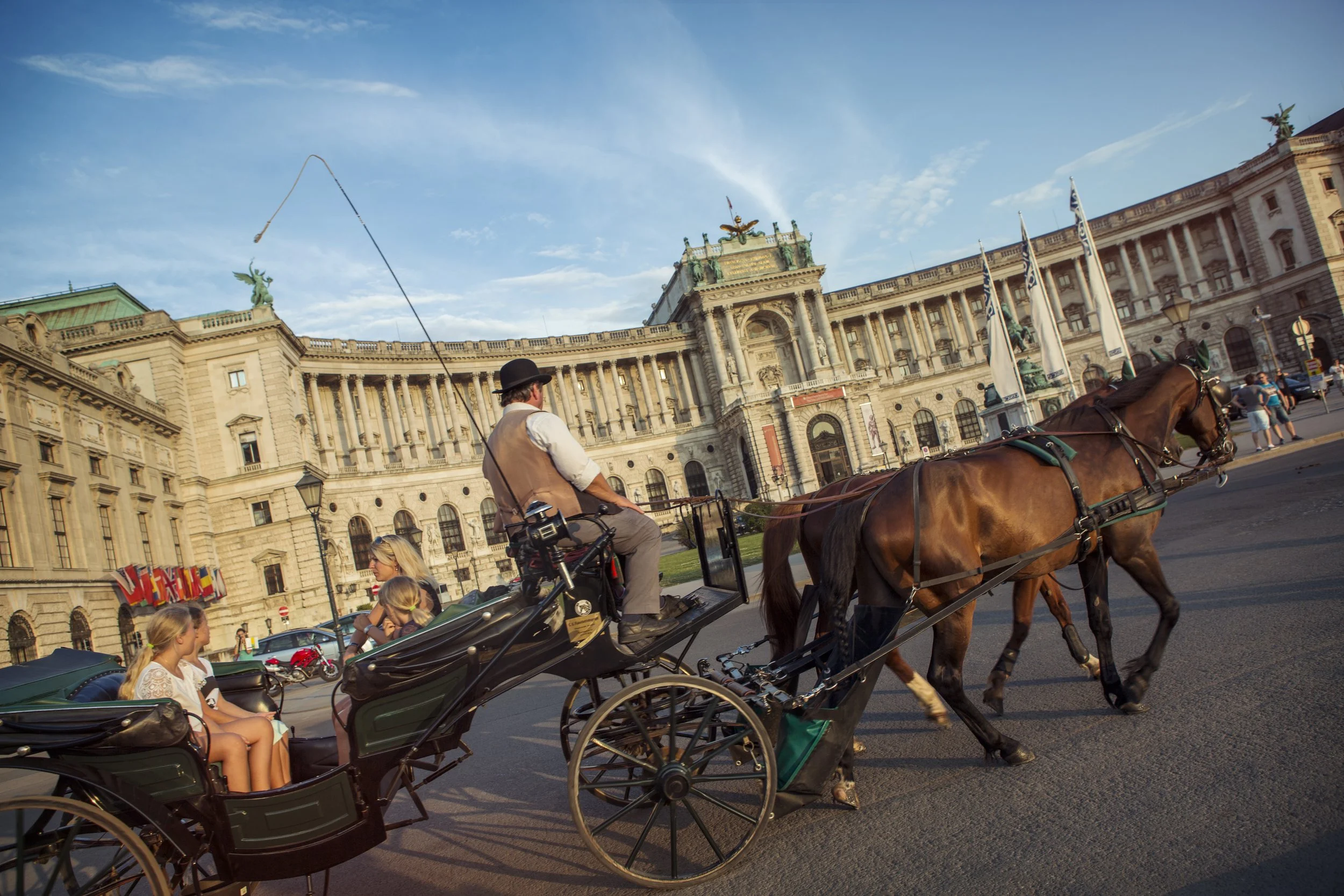 G Adventures Europe Austria Vienna Horse Carriage National Library.jpg