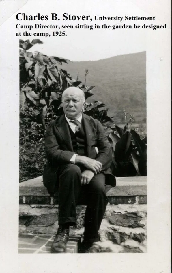 Charles B. Stover at University Settlement Camp, 1925. Stover is sitting on a garden wall he built himself at the camp.