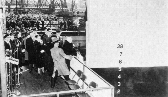 Mrs. James Forrestal christens the carrier,Dec. 11,1954