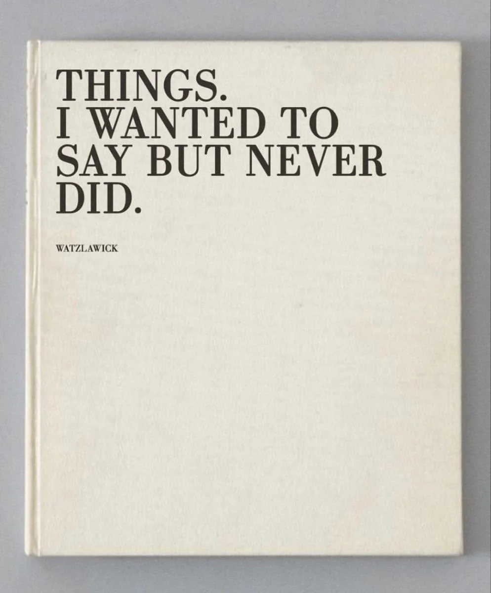 A white book with black text on the cover that reads, 'Things I wanted to say but never did,' and the author's name, Watzlawick.