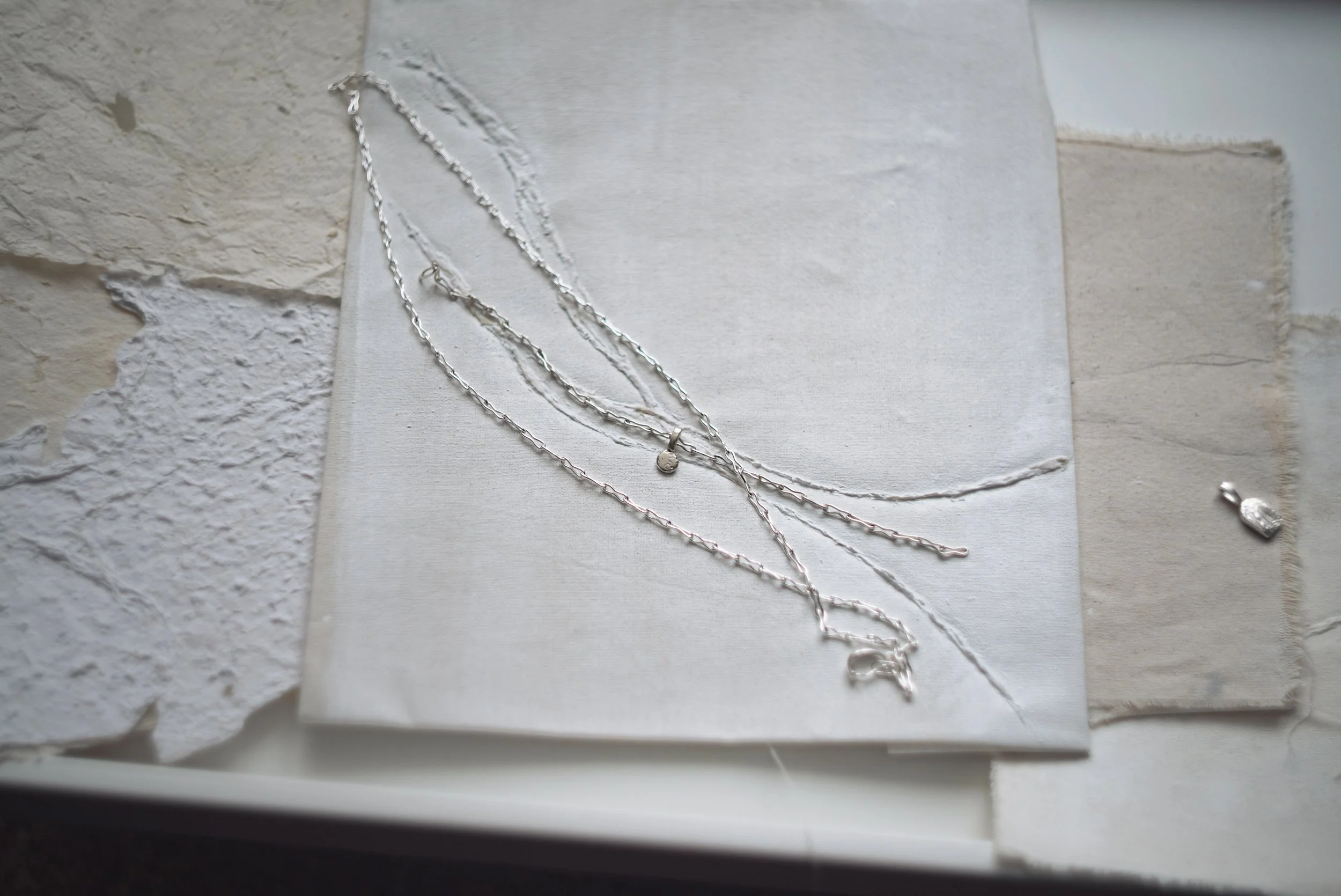 Chains on canvas and paper