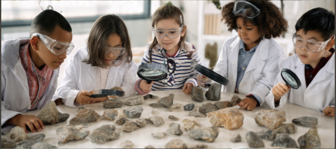 Group of students observing rock samples