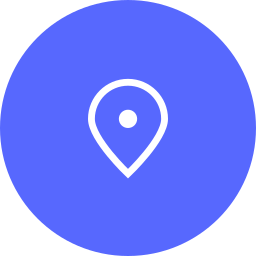 Icon of a location pin on a blue circular background.